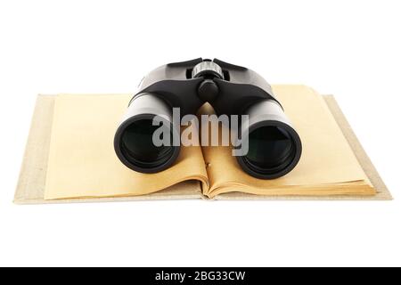 Black modern binoculars with old notebook isolated on white Stock Photo