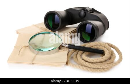 Black modern binoculars with old letters isolated on white Stock Photo