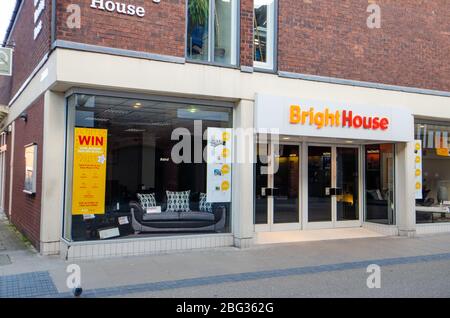 Chester, UK: Mar 1, 2020: A poster promotes a competition to win your account paid off in full at the BrightHouse store on Frodsham Street. Stock Photo