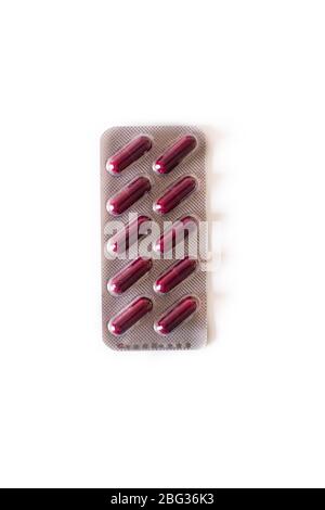 Red medical pills isolated on white background Stock Photo