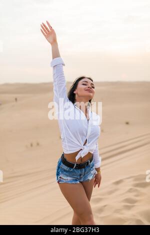 Woman Posing in Desert Landscape · Free Stock Photo