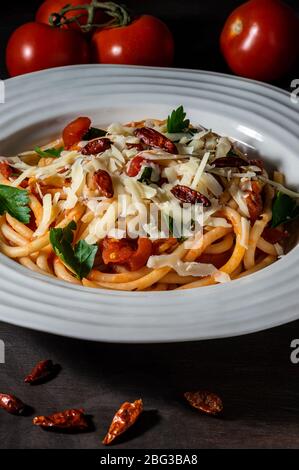 Vegetarian bucatini pomodoro. Stock Photo