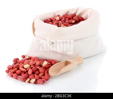 Peanuts in sack isolated on white Stock Photo