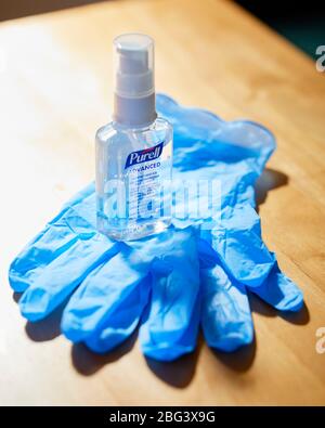 Surgical gloves and hand cleanser gel Stock Photo