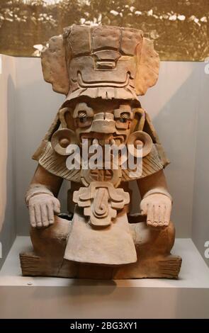 Pre-Columbian era. Central Oaxaca Culture. Zapotec urn. God of rain Cocijo. Period III. MExico. American Museum of Natural History, NYC, USA. Stock Photo
