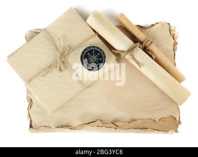 Old paper, scrolls and compass isolated on white Stock Photo