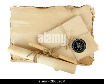 Old paper, scrolls and compass isolated on white Stock Photo