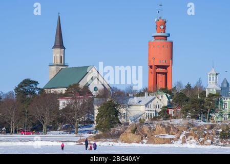 Church and old water tower in a winter cityscape. Hanko, Finland Stock Photo