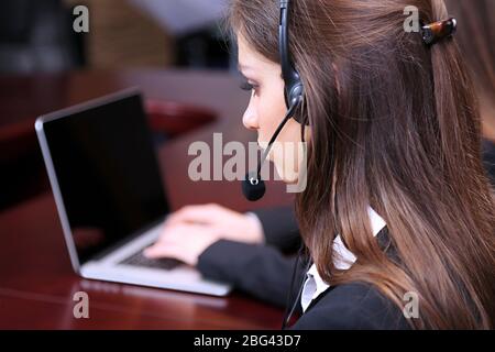 Call center operators at work Stock Photo