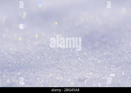 Texture of snow. Snow winter background. Sparkling snow with bokeh Stock Photo