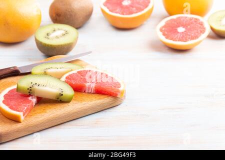 Food and place for diet plan on a wooden background. Concept of diet and healthy lifestyle. Stock Photo