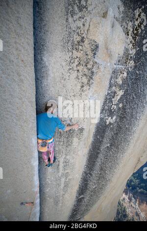 Climber resting while lead climbing on The Nose Changing Corners Stock Photo