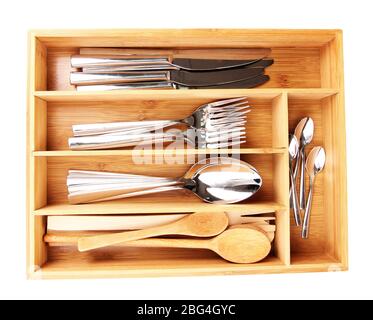 Wooden cutlery box with checked cutlery isolated on white Stock Photo