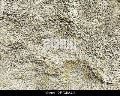 Unfinished cement wall rustic industry design decoration idea .Stucco on the wall with a texture of white and gray. Stock Photo