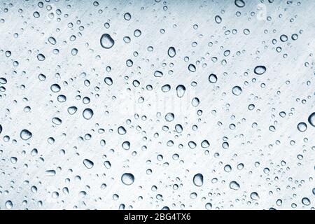 Water drops on brushed metal surface Stock Photo