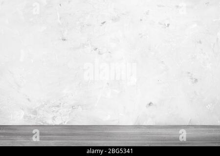 gray concrete wall and gray wood floor (focus on concrete wall on background) Stock Photo