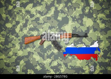 Russian automatic rifle lies on camouflage background Stock Photo