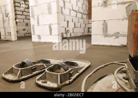 Sand-cement screed in a house with underfloor heating.2020 Stock Photo