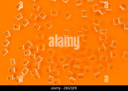 abstract plastic parallelepipedic shapes on a orange background Stock Photo