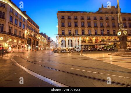 Bordeaux, France - 19 January, 2017 : Bordeaux downtown at twilight with shops and railway in summer Stock Photo