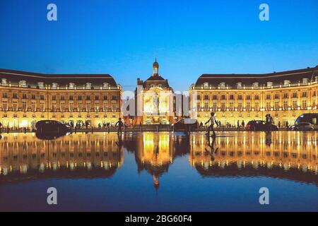 Bordeaux, France - 3 September, 2018 : Reflection of Place De La Bourse and tram in Bordeaux, France. A Unesco World Heritage Stock Photo
