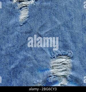 Old denim japan jean texture. Jeans torn denim texture. Denim jeans ripped destroyed Stock Photo