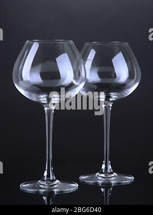 https://l450v.alamy.com/450v/2bg6d40/empty-wine-glasses-on-grey-background-2bg6d40.jpg