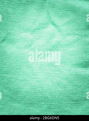 Turquoise fabric background texture.  Turquoise background from a textile material Stock Photo