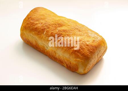 An isolated homemade white bread on a white background Stock Photo