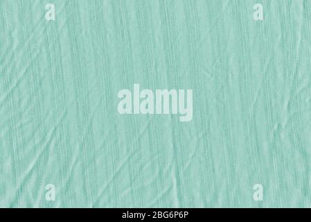Turquoise fabric background texture.  Turquoise background from a textile material Stock Photo