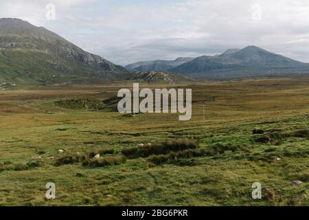 View of Cranstackie and Ceann Garbh from the North Coast 500 tourist route near the Kyle of Durness in the North West Highlands of Scotland, UK. Stock Photo