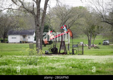 Luling, USA. 20th Apr, 2020. File photo taken on March 12, 2019 shows an operating oil pump in Luling of Texas, the United States. U.S. oil prices turned negative on April 20, 2020. West Texas Intermediate crude for May delivery shed more than 300 percent to settle at -37.63 U.S. dollars per barrel on the New York Mercantile Exchange. Credit: Wang Ying/Xinhua/Alamy Live News Stock Photo