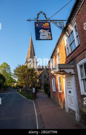 All Saints Church and The Tiger Church House in High Street, Lindfield village, West Sussex, England. Stock Photo