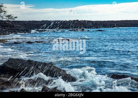 the shoreline at Kanahena Beach, Maui Hawaii Stock Photo