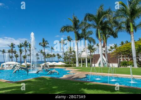 FOUNTAIN with dolphins on the grounds of the GRAND WAILEA RESORT HOTEL - MAUI, HAWAII Stock Photo