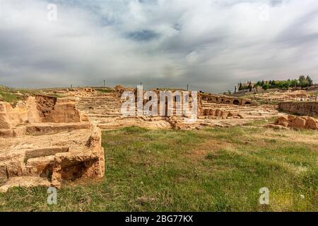 It is the most famous city in the old Mesopotamia region. This city has become a medium-sized town / village settlement today. Dara Town Ruins in Rock Stock Photo