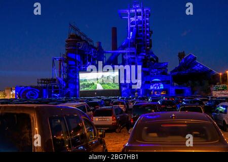 Drive-in cinema Dortmund, against the backdrop of the former blast furnace plant Phoenix-West in Dortmund-Hörde, temporary film screening, event in co Stock Photo