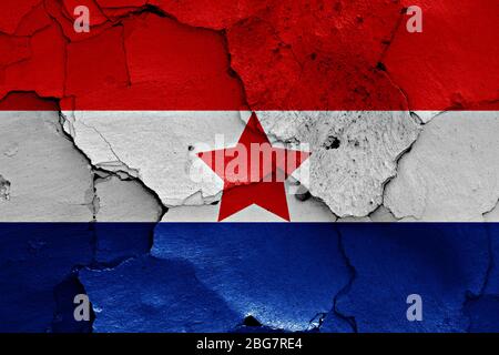 flag of Croatian Partisans painted on cracked wall Stock Photo