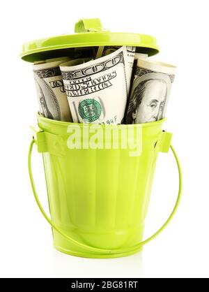 Money in  trash can, isolated on white Stock Photo