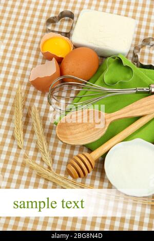 Cooking concept. Basic baking ingredients and kitchen tools isolated on ...