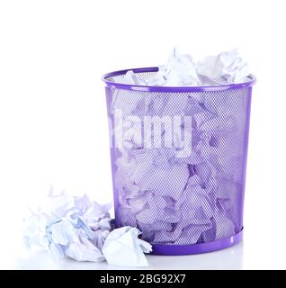 Recycle bin filled with crumpled papers, isolated on white Stock Photo