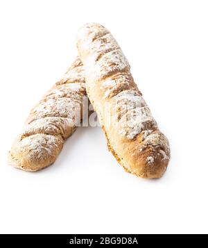 Two fresh whole grain bread baguettes isolated on white background. Stock Photo