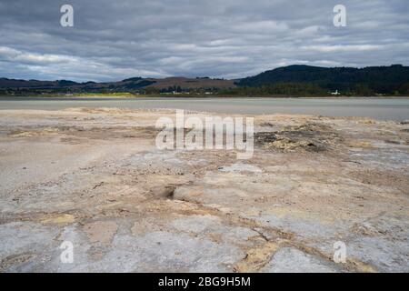 Sulphur Flat on shore of Lake Rotorua, Sulphur Point Walk, Rotorua, North Island, New Zealand Stock Photo