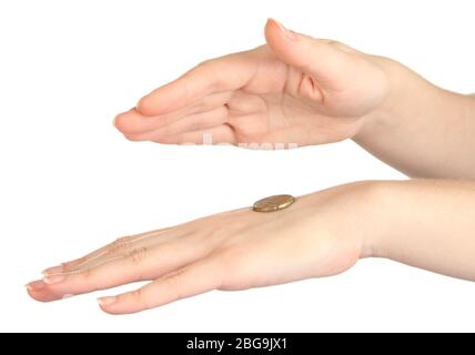 Hands of woman flipping coin isolated on white Stock Photo