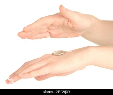 Hands of woman flipping coin isolated on white Stock Photo