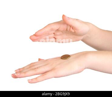 Hands of woman flipping coin isolated on white Stock Photo