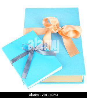 Books wrapped with color ribbons, isolated on white Stock Photo - Alamy