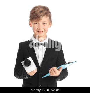 Little journalist with microphone on white background Stock Photo