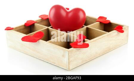 Heart in wooden casket, isolated  on white background Stock Photo