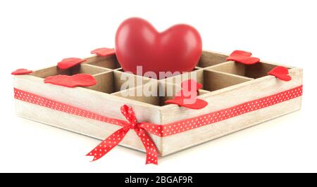 Heart in wooden casket, isolated  on white background Stock Photo